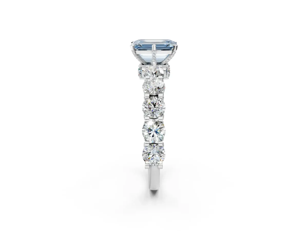 Fancy Blue Emerald Cut Diamond Side Stone Engagement Ring with Four-Prong Setting White gold