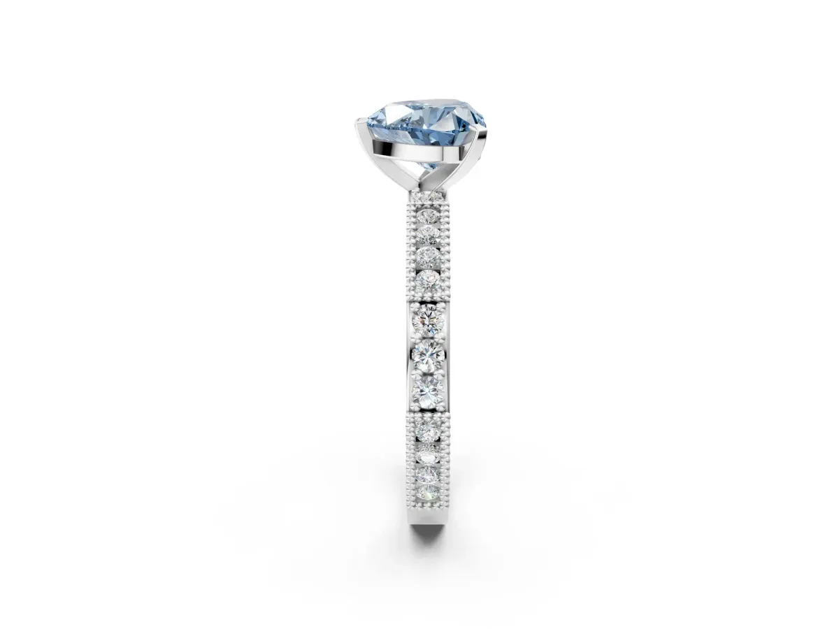 Fancy Blue Heart Cut Solitaire with Pavé Band and Four-Prong Setting Silver