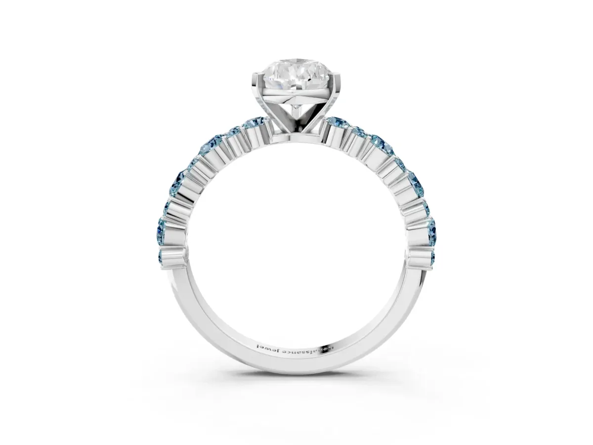 Pear Cut Diamond Side Stone Solitaire Ring with Round Aquamarine and Four-Prong Setting Silver
