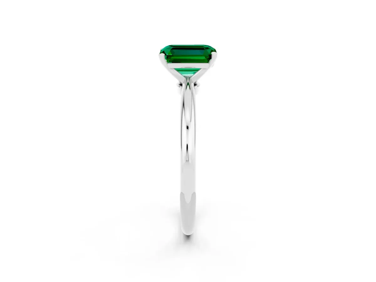 Emerald Cut Emerald Solitaire Ring with Six-Prong Setting and Classic Band Silver