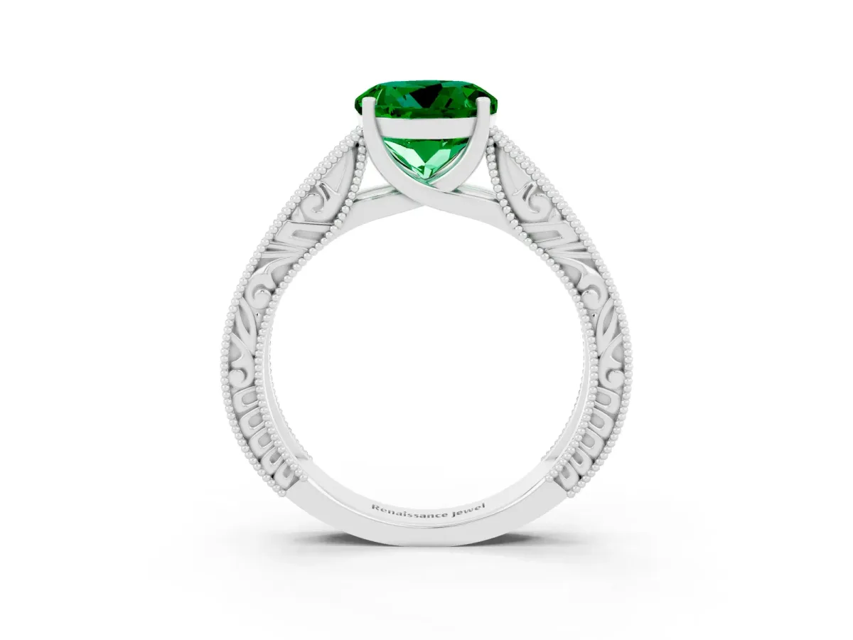 Round Cut Emerald Solitaire Ring with Engraved Band and Four-Prong Setting White gold