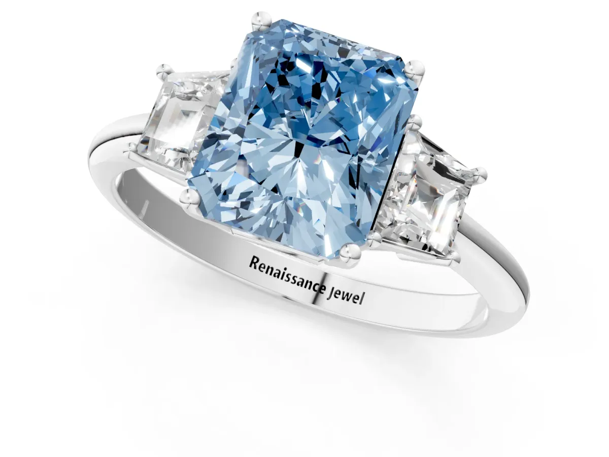 Fancy Blue Radiant Cut Diamond Three-Stone Ring with Trapezoid Side Stones and Prong Setting Silver