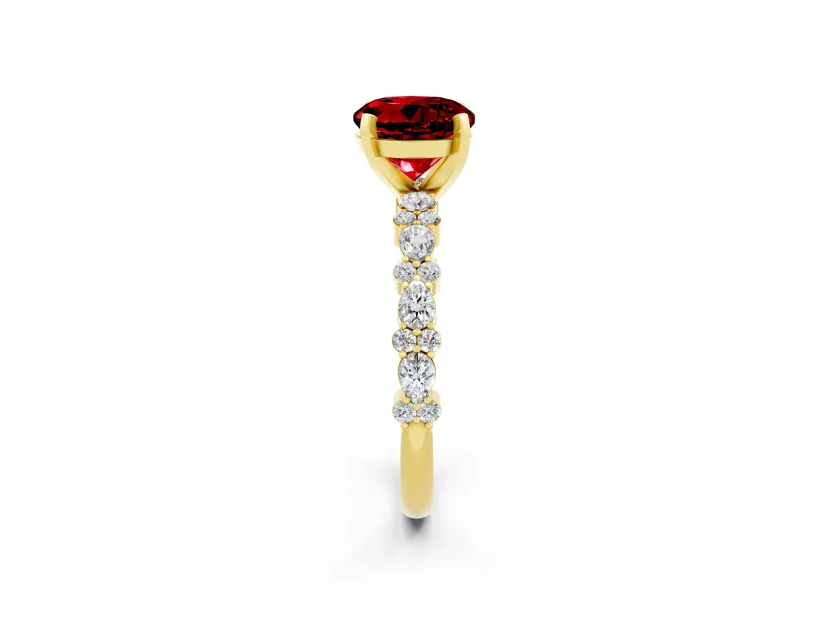 Round Cut Ruby Side Stone Solitaire Ring with Round and Four-Prong Setting Yellow gold