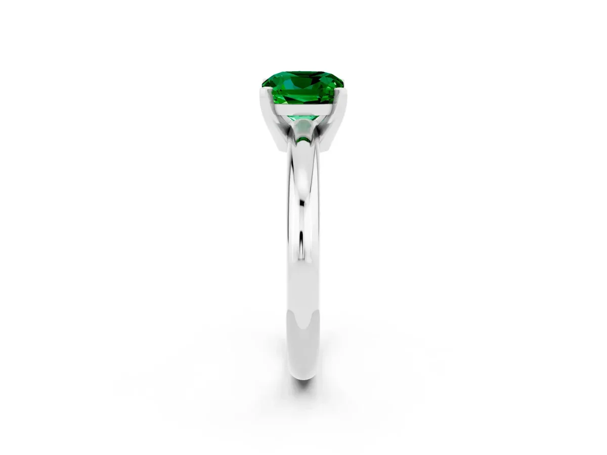 Cushion Cut Emerald Solitaire Engagement Ring with Round Band and Four-Prong Setting Silver