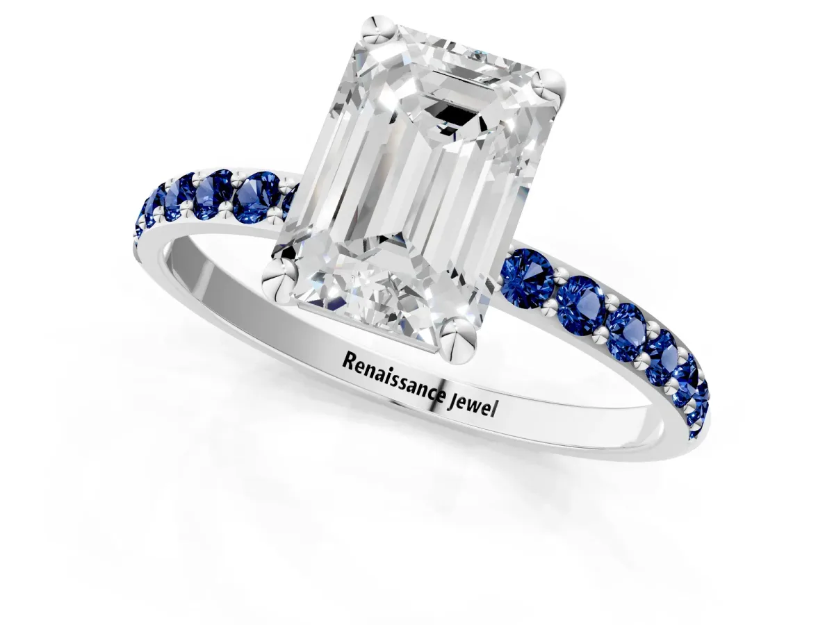 Emerald Cut Diamond Solitaire Ring with Round Blue Sapphire Pavé Band and Prong Setting Silver