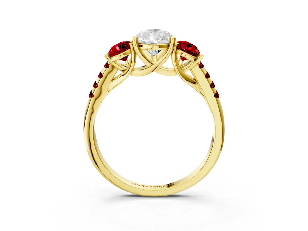 Three-Stone Pear Cut Diamond Ring with Round Ruby Pavé Band and Prong Setting Yellow gold