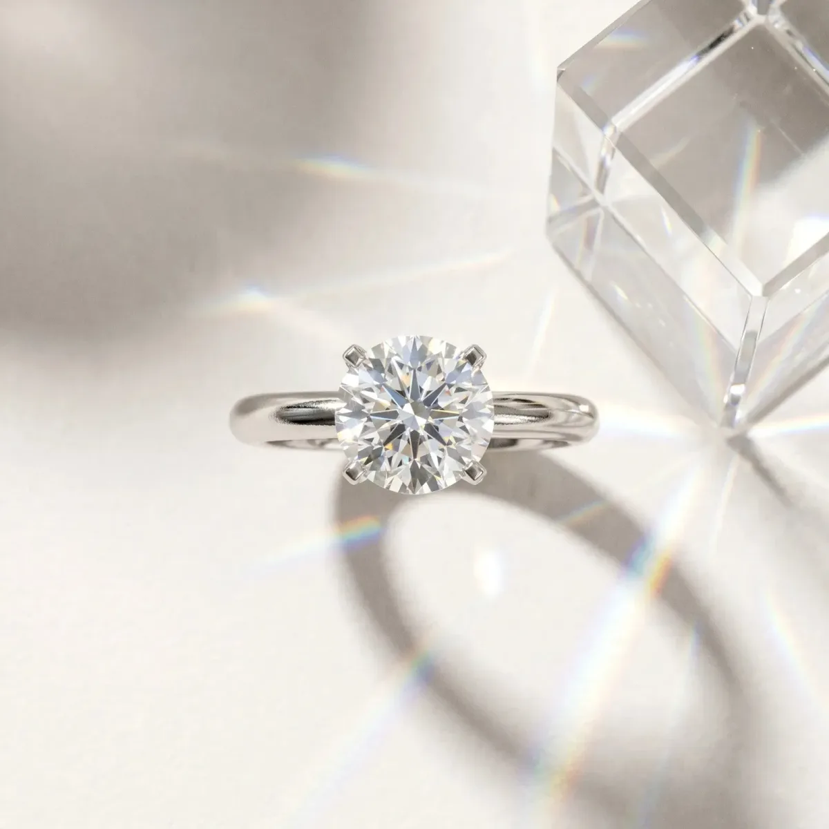 Round Cut Diamond Solitaire Engagement Ring with Round Band and Four-Prong Setting Silver