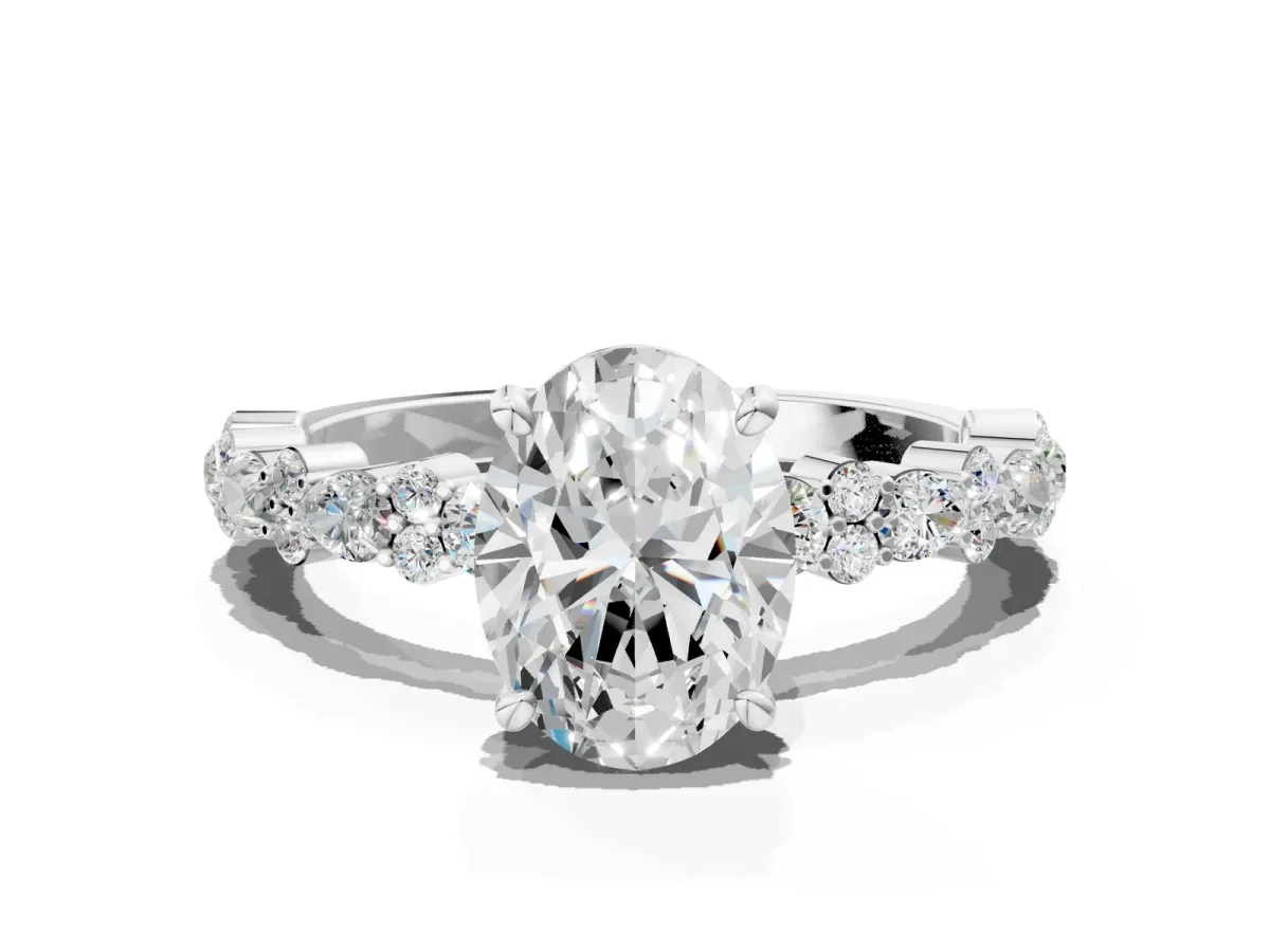 Oval Cut Diamond Side Stone Solitaire Ring with Round and Four-Prong Setting White gold