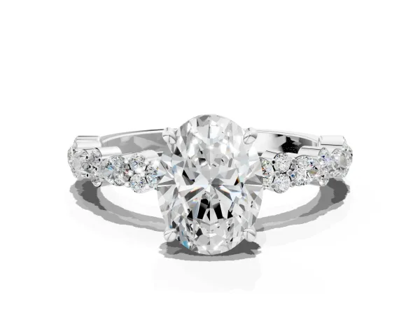 Oval Cut Diamond Side Stone Solitaire Ring with Round and Four-Prong Setting White gold