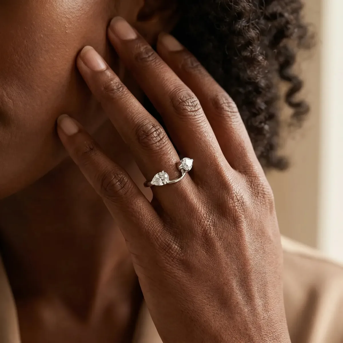 Two-Stone Pear Diamond Bypass Ring with Prong Setting Platinum