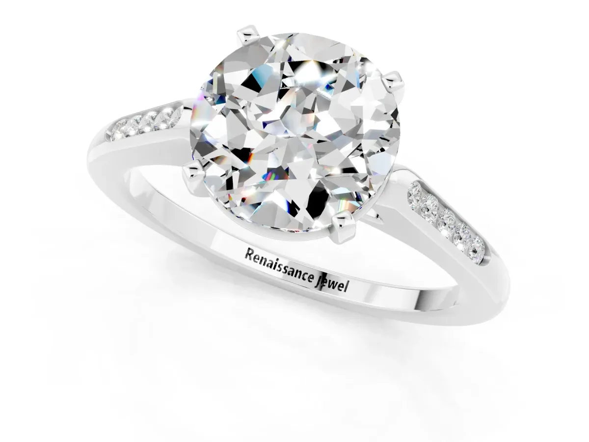 Round Cut Moissanite Solitaire Ring with Channel Set Round Band and Prong Setting Silver