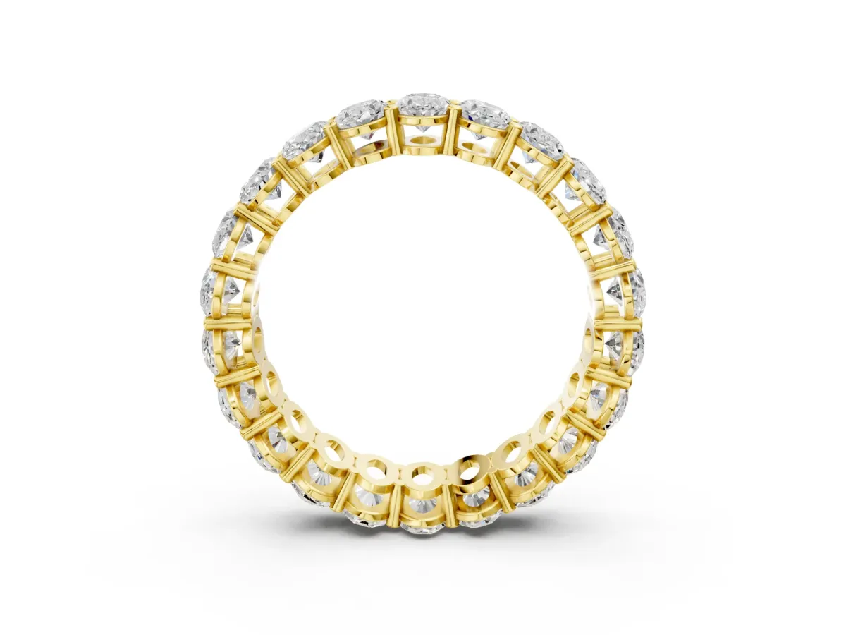 Oval Cut Diamond Eternity Band with Shared Prong Setting Yellow gold