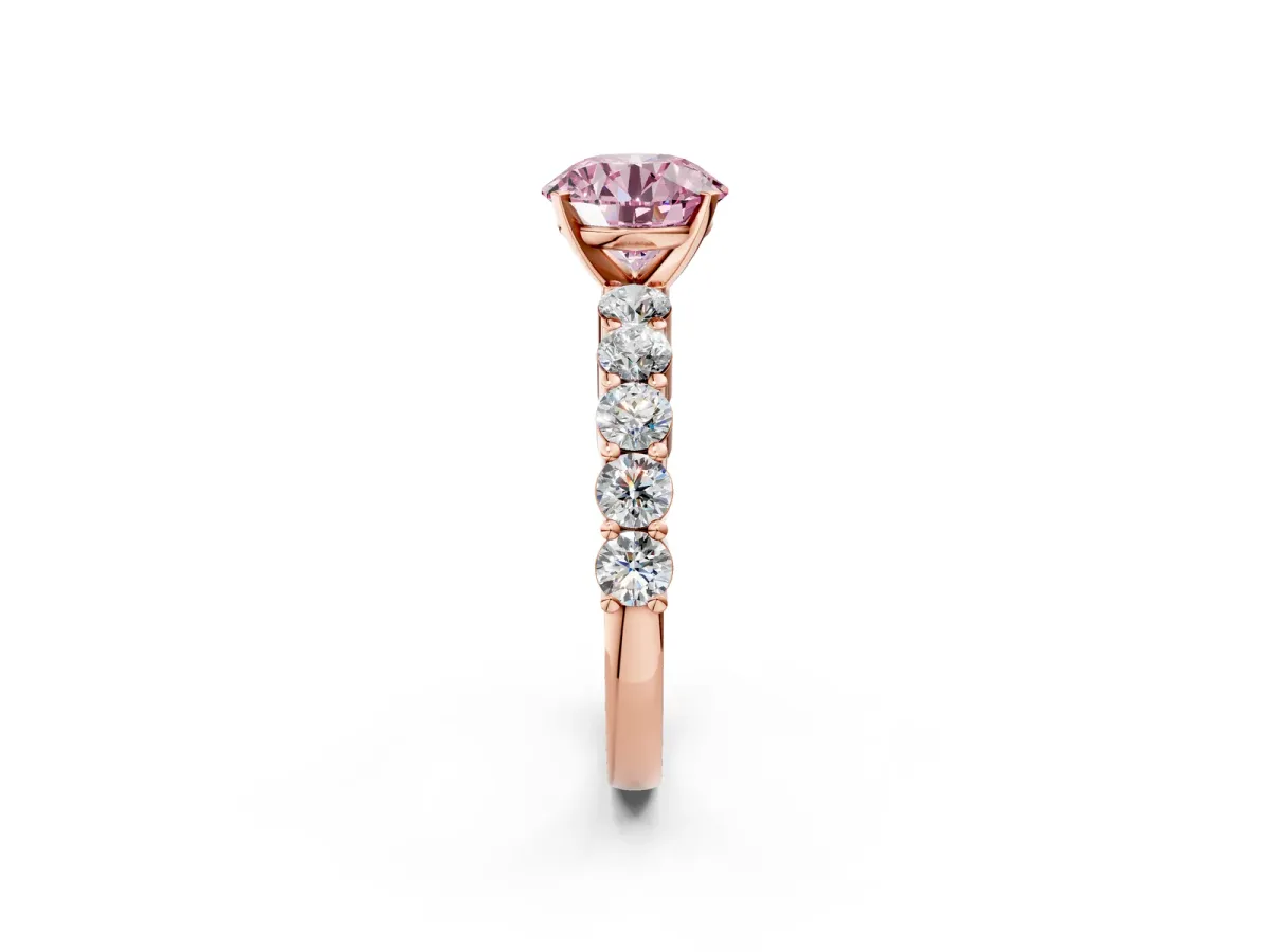Fancy Pink Round Cut Diamond Solitaire Ring with Shared Prong Round Side Stones Rose gold