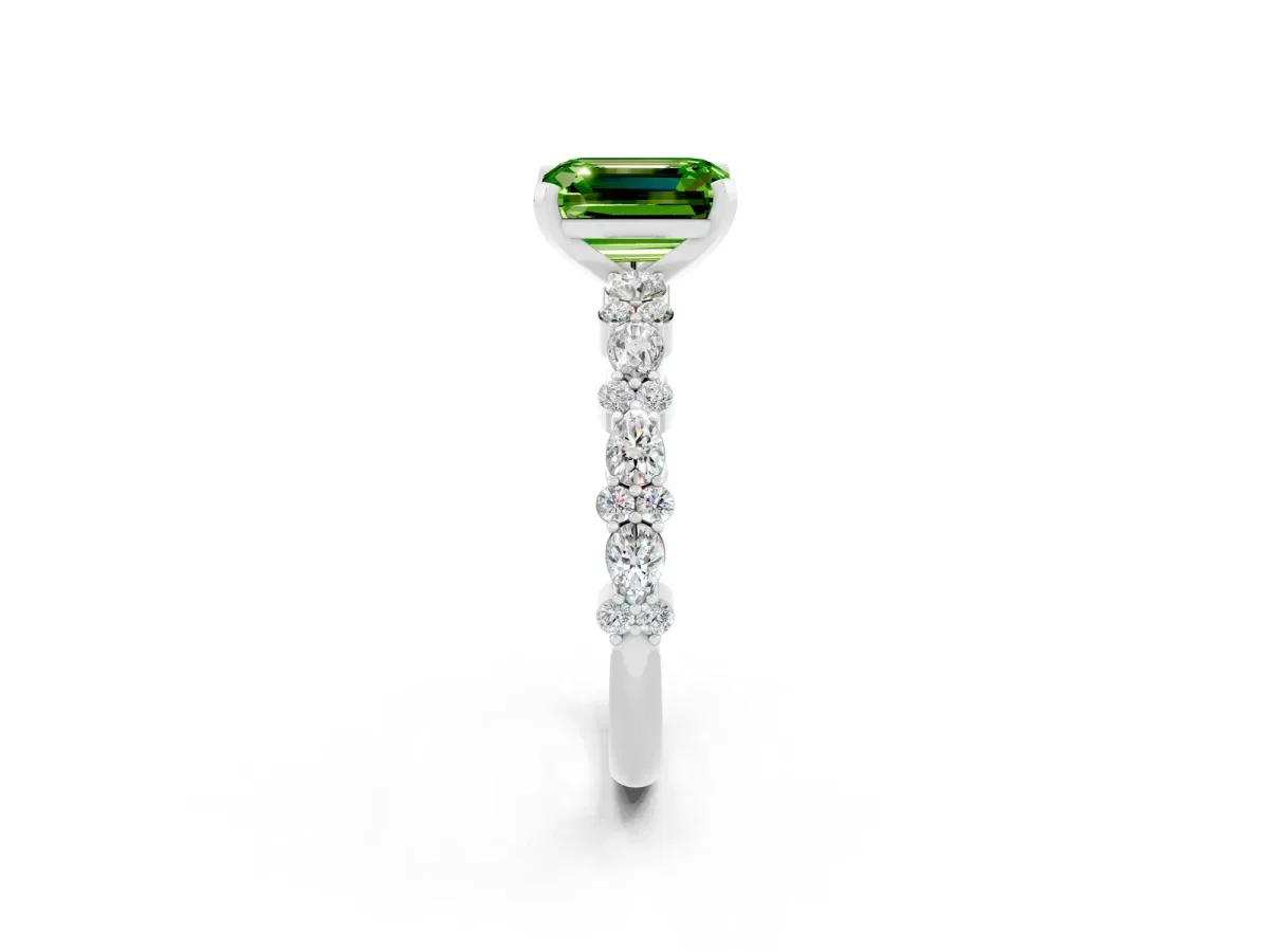 Emerald Cut Peridot Side Stone Solitaire Ring with Round and Four-Prong Setting Silver