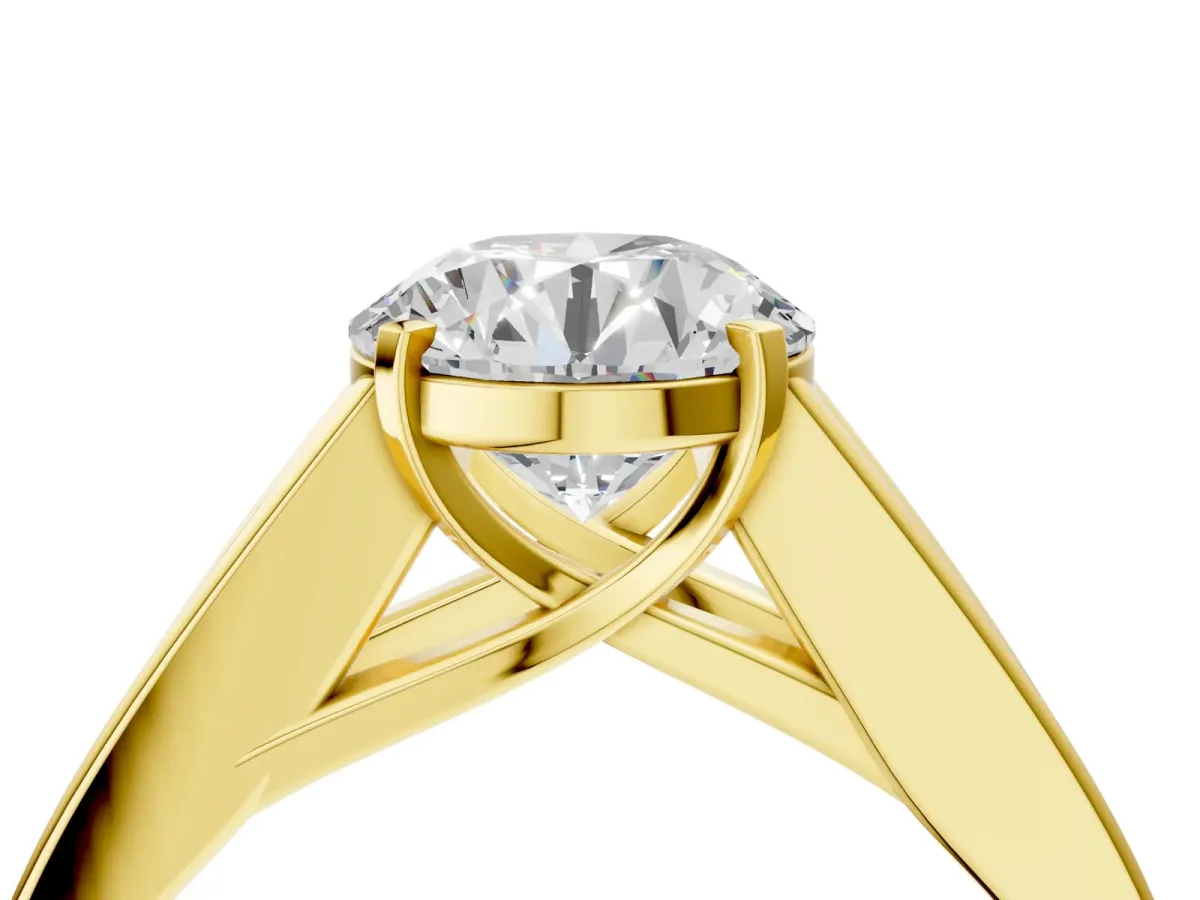 Round Cut Cut Channel Set Solitaire Ring with Four-Prong Setting Yellow gold