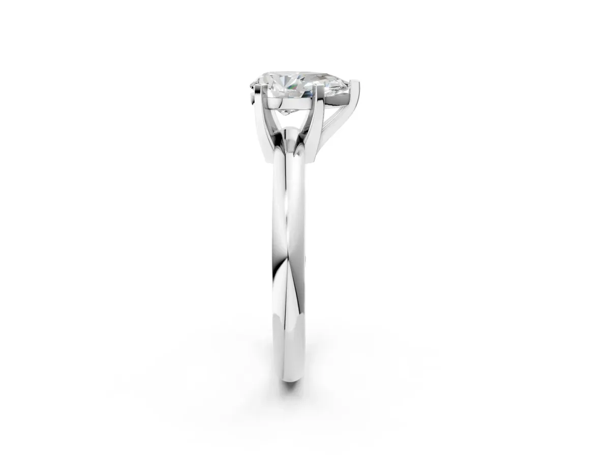 Pear Cut Diamond Solitaire Engagement Ring with Round Band and Four-Prong Setting Silver