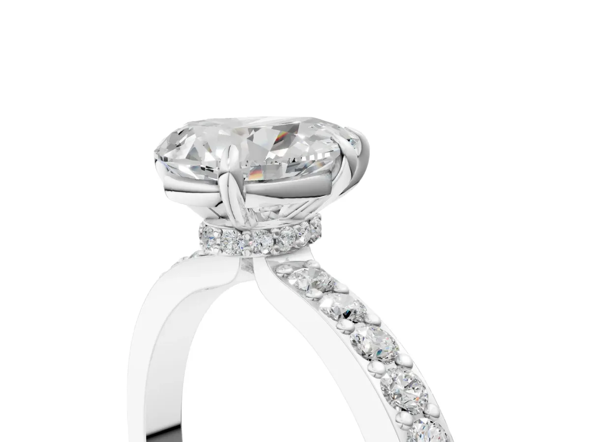 Pear Cut Diamond Solitaire Engagement Ring with Pavé Band and Four-Prong Setting Silver