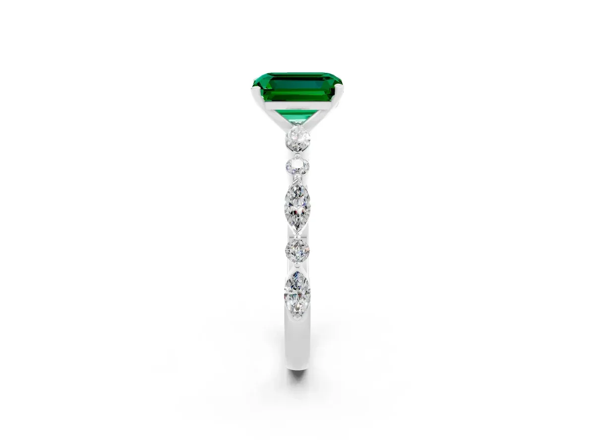 Emerald Cut Emerald Ring with Marquise and Round Side Stones and Four-Prong Setting Platinum
