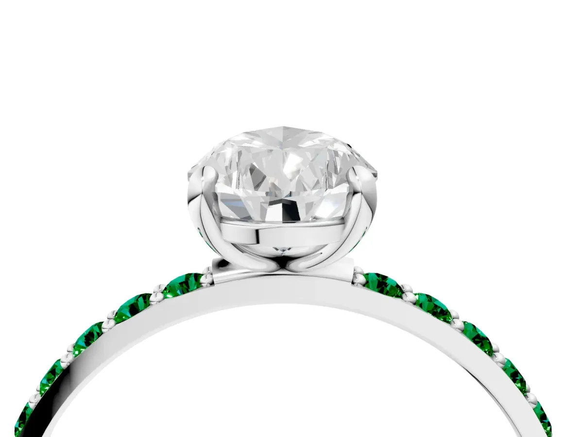 Pear Cut Diamond Solitaire Ring with Round Emerald Pavé Band and Prong Setting Platinum