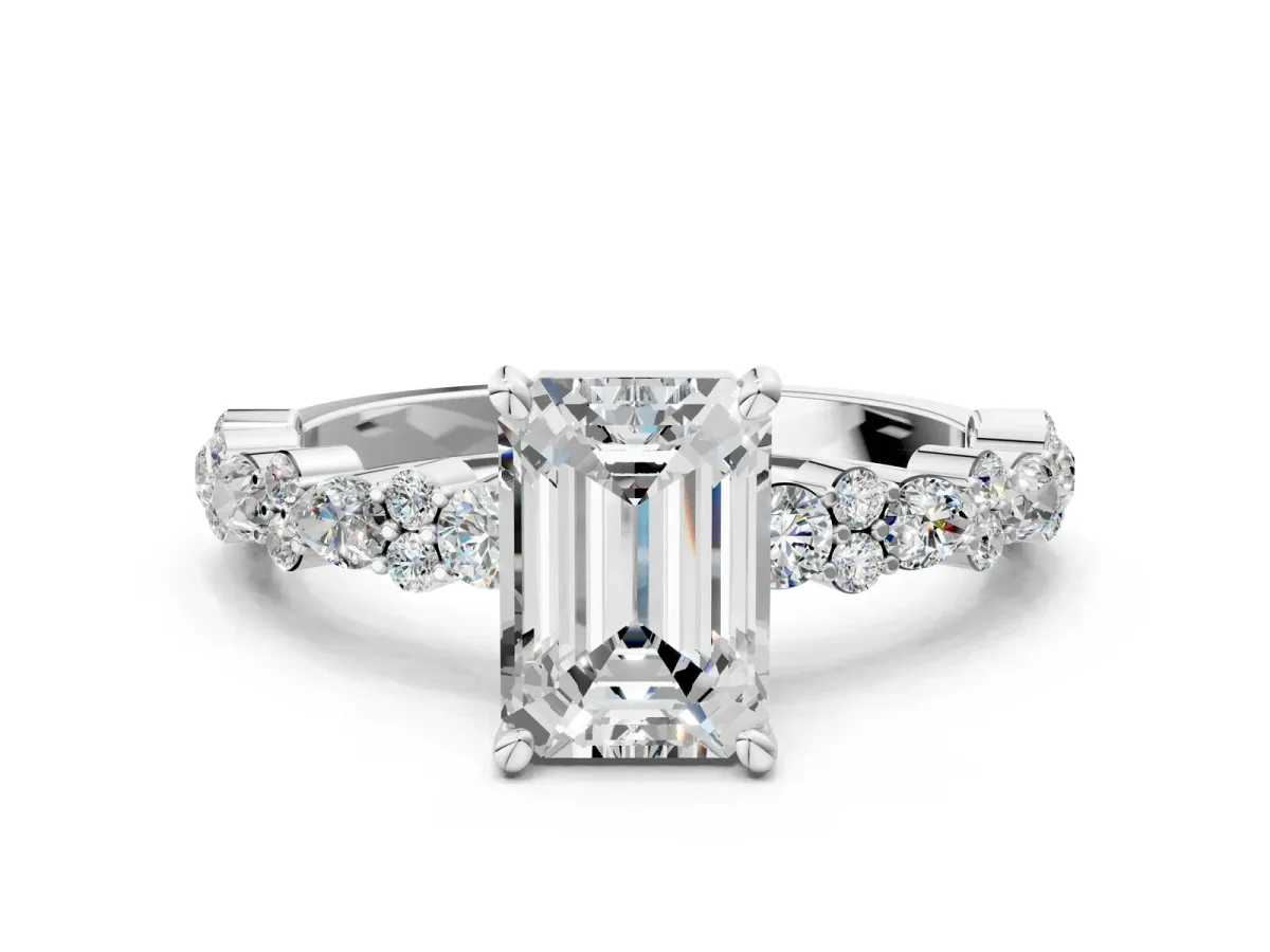 Emerald Cut Diamond Side Stone Solitaire Ring with Round and Four-Prong Setting White gold