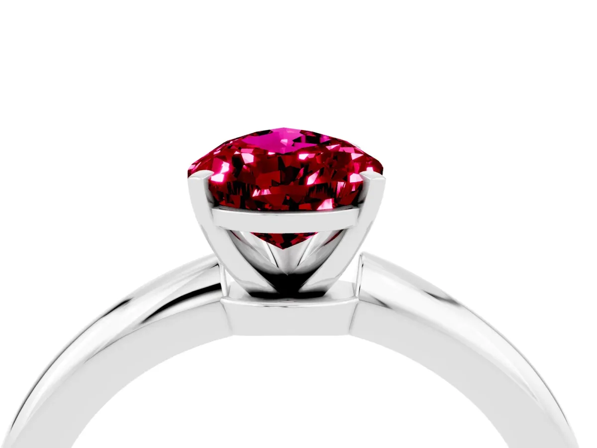 Pear Cut Garnet Solitaire Ring with Six-Prong Setting and Classic Band Silver