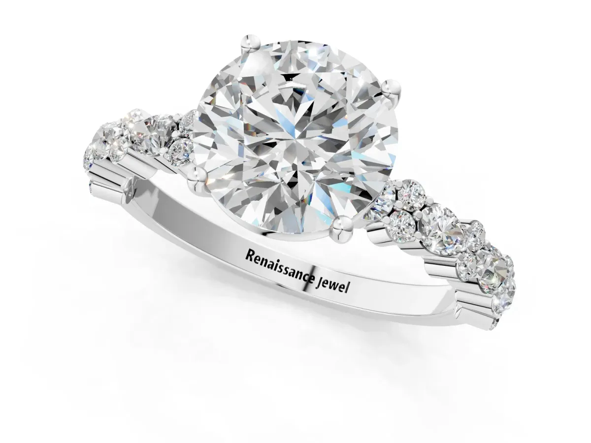 Round Cut Diamond Side Stone Solitaire Ring with Round and Four-Prong Setting White gold