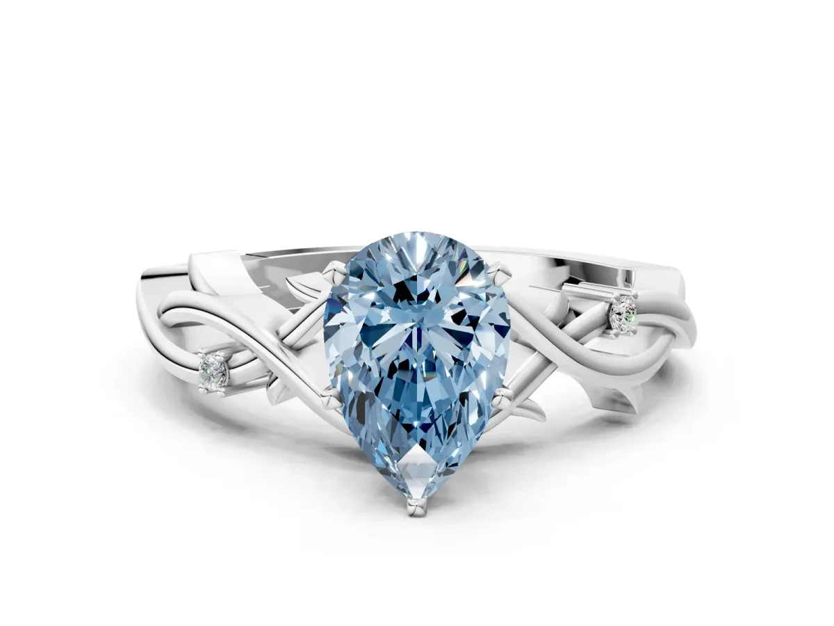 Fancy Blue Pear Cut Diamond Solitaire Ring with Twisted Band and Prong Setting White gold