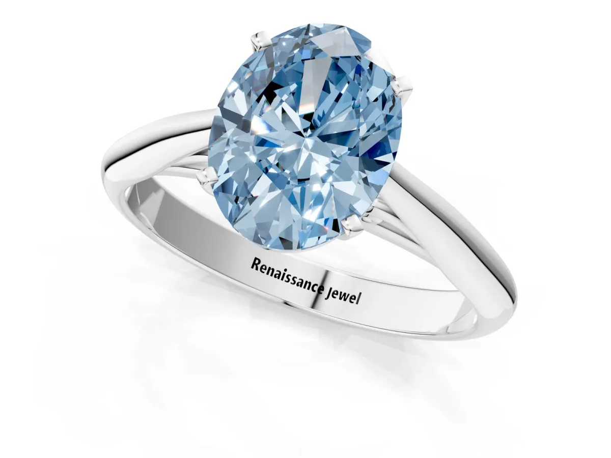 Fancy Blue Oval Cut Diamond Solitaire Engagement Ring with Cathedral Setting and Four-Prong Mount Platinum