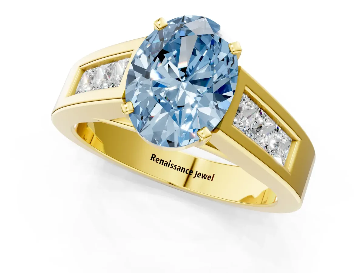Fancy Blue Oval Cut Cut Channel Set Solitaire Ring with Four-Prong Setting Yellow gold