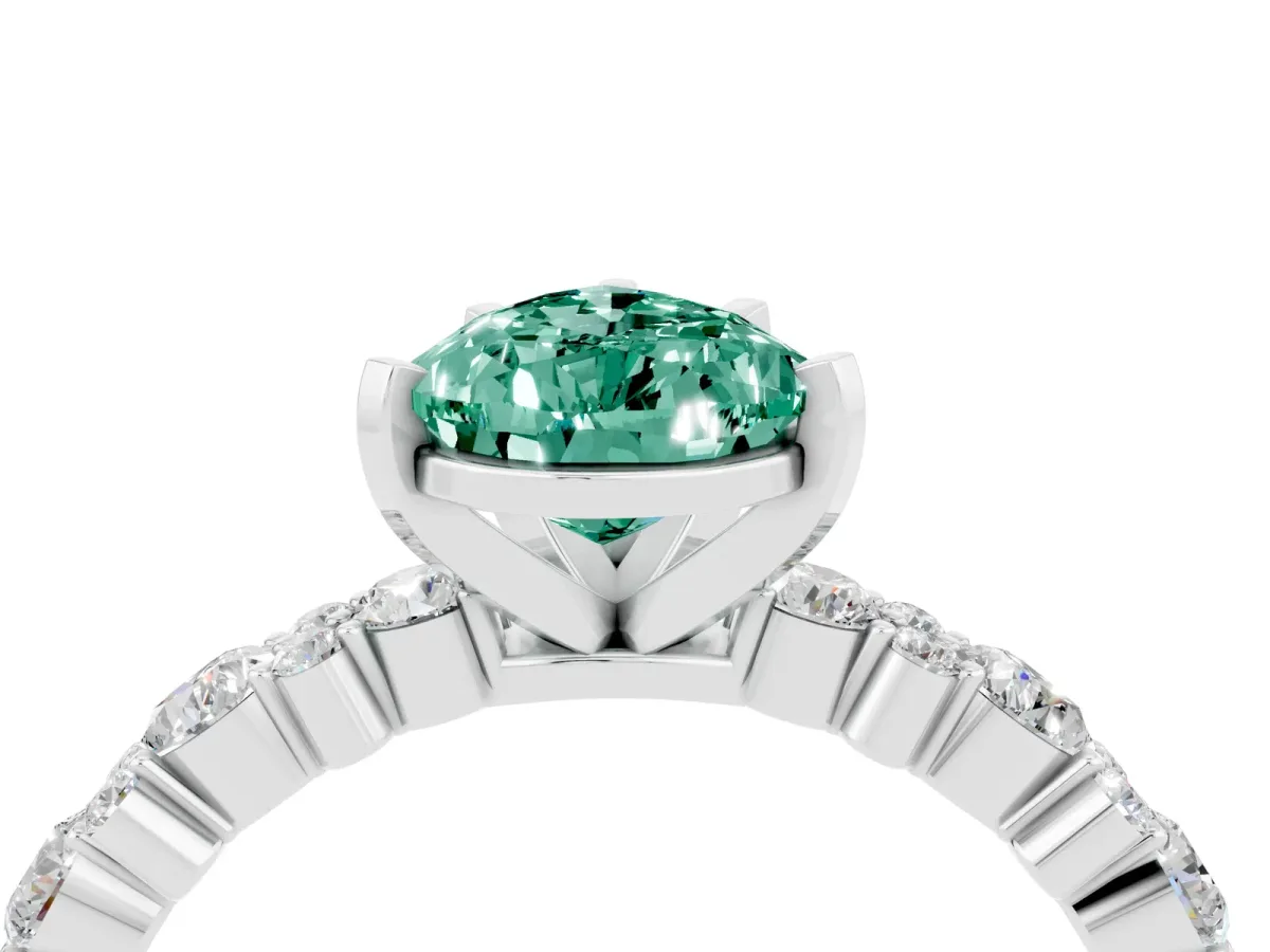 Pear Cut Green Sapphire Side Stone Solitaire Ring with Round and Four-Prong Setting Platinum