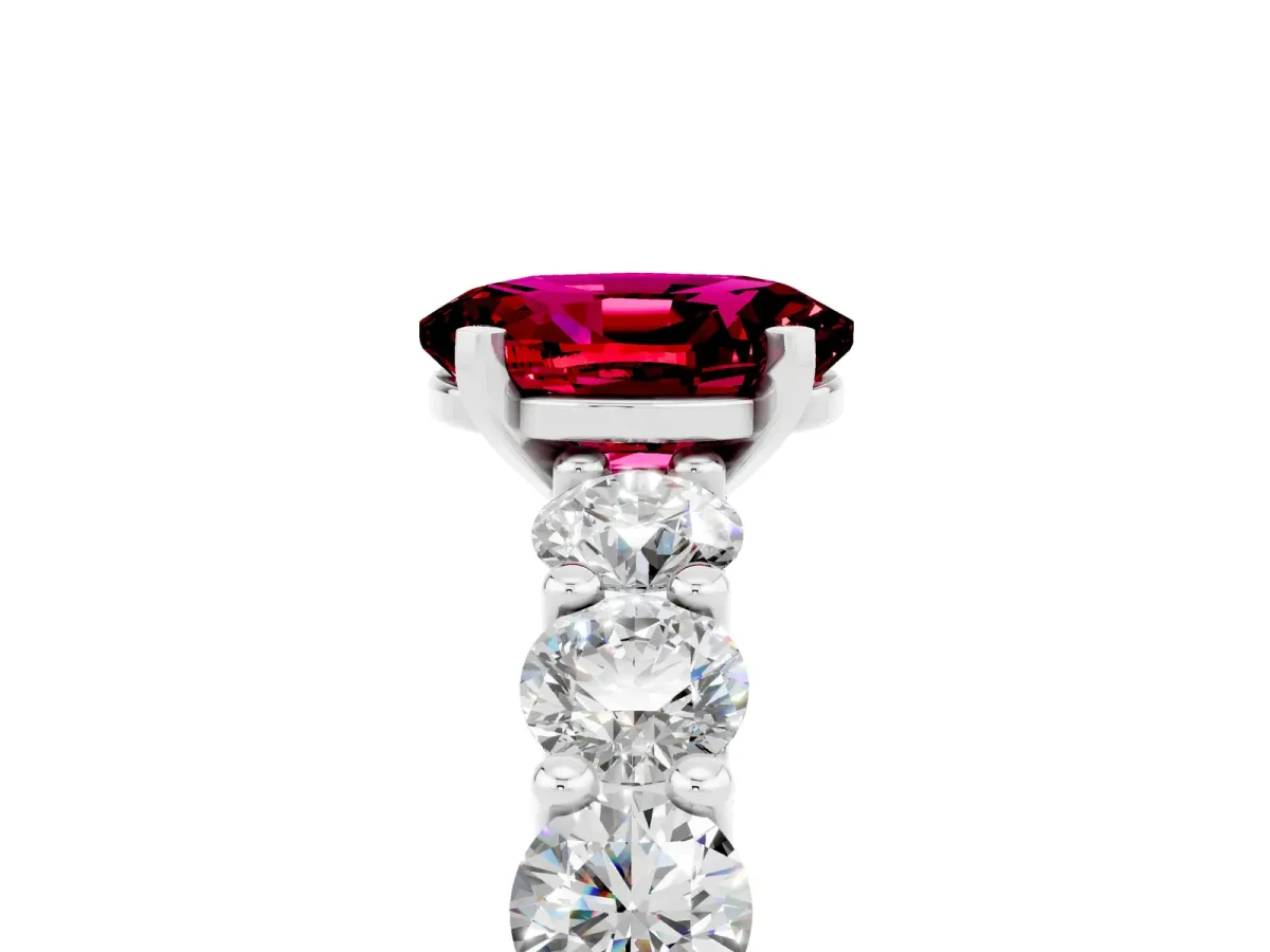 Oval Cut Garnet Prong Setting with Side Stones on a Pave Band Silver
