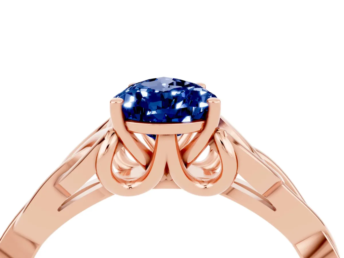 Pear Cut Blue Sapphire Solitaire Celtic Knot Ring with Four-Prong Setting Rose gold