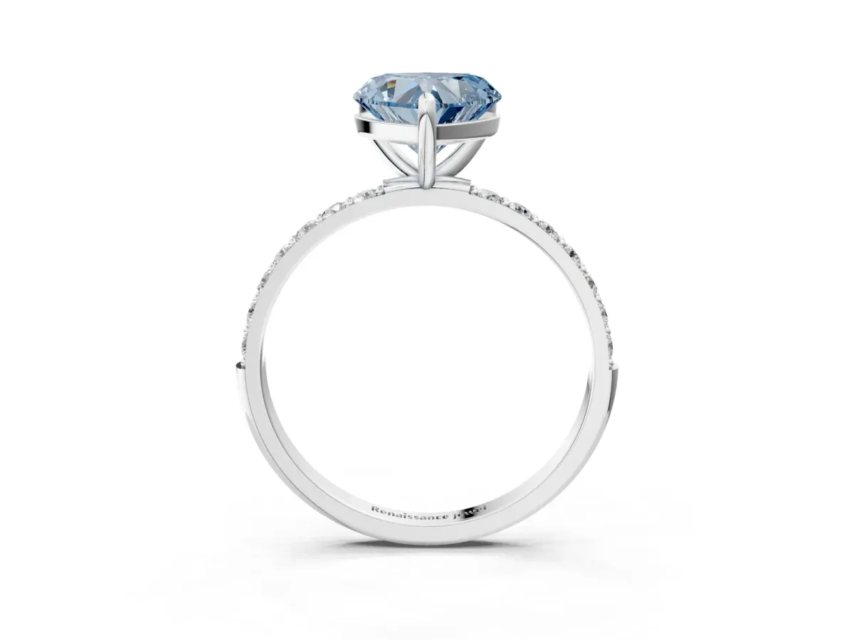 Fancy Blue Heart Cut Diamond Solitaire Ring with Round Pavé Band and Prong Setting Silver