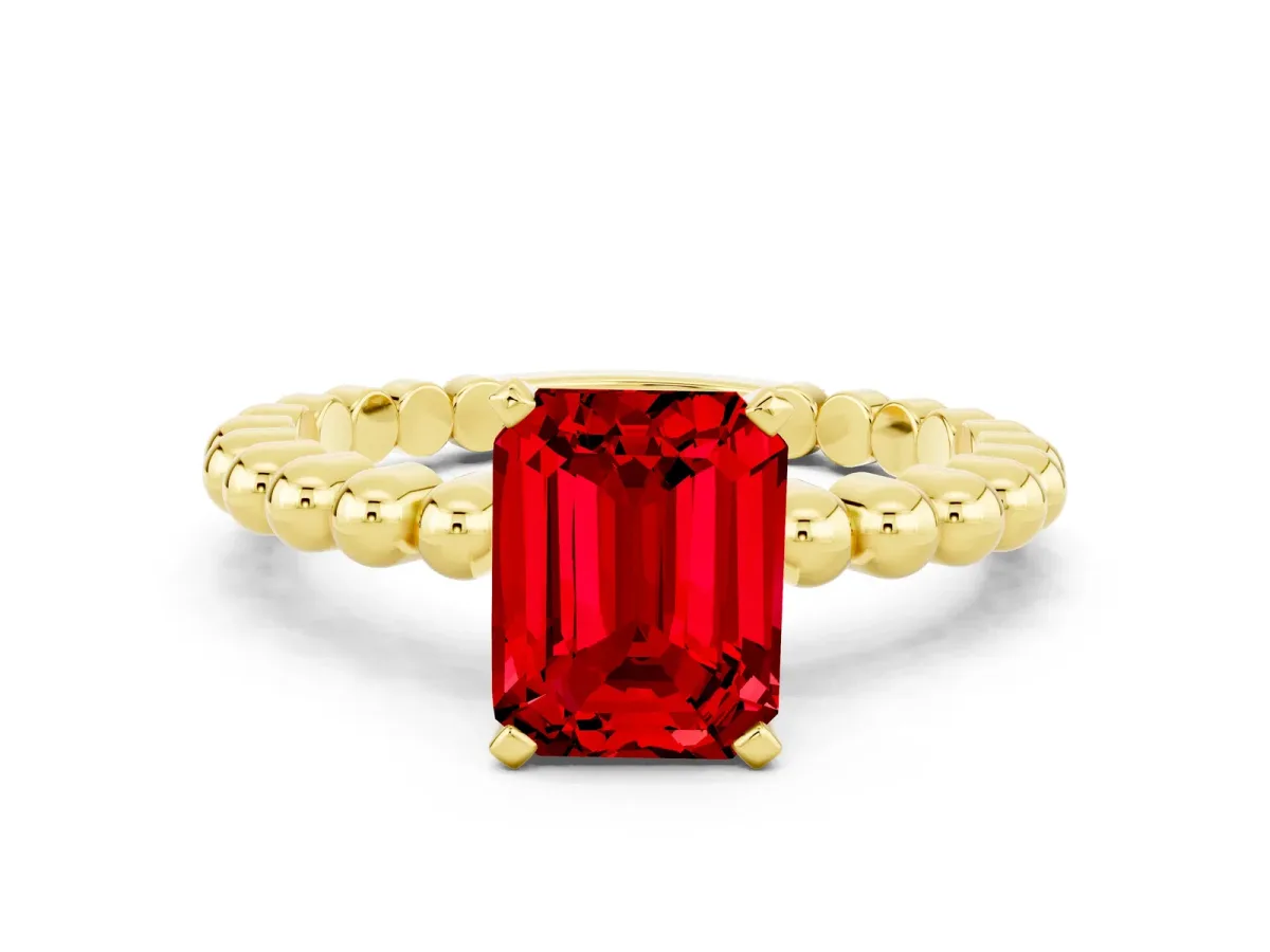 Emerald Cut Ruby Solitaire Ring with Beaded Band and Prong Setting Yellow gold