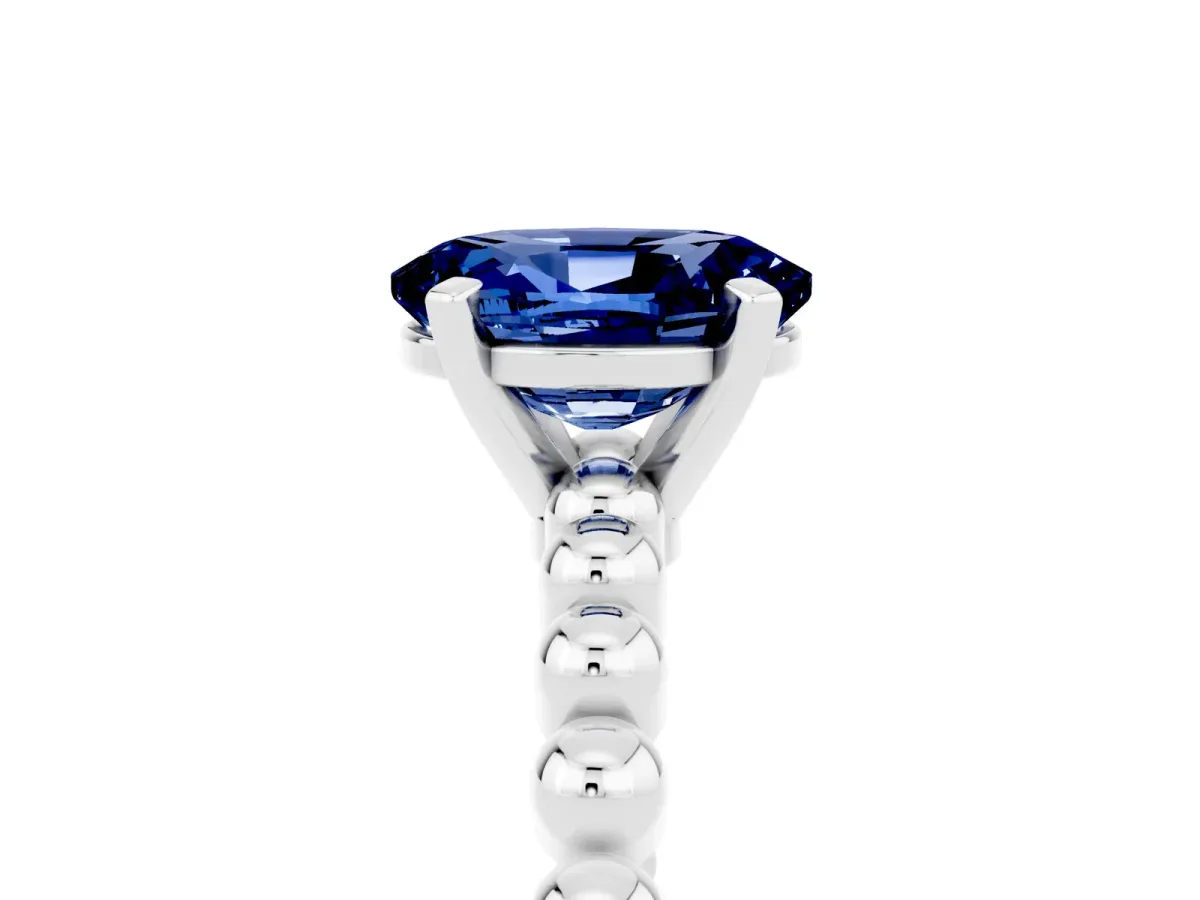 Oval Cut Blue Sapphire Solitaire Ring with Beaded Band and Prong Setting White gold