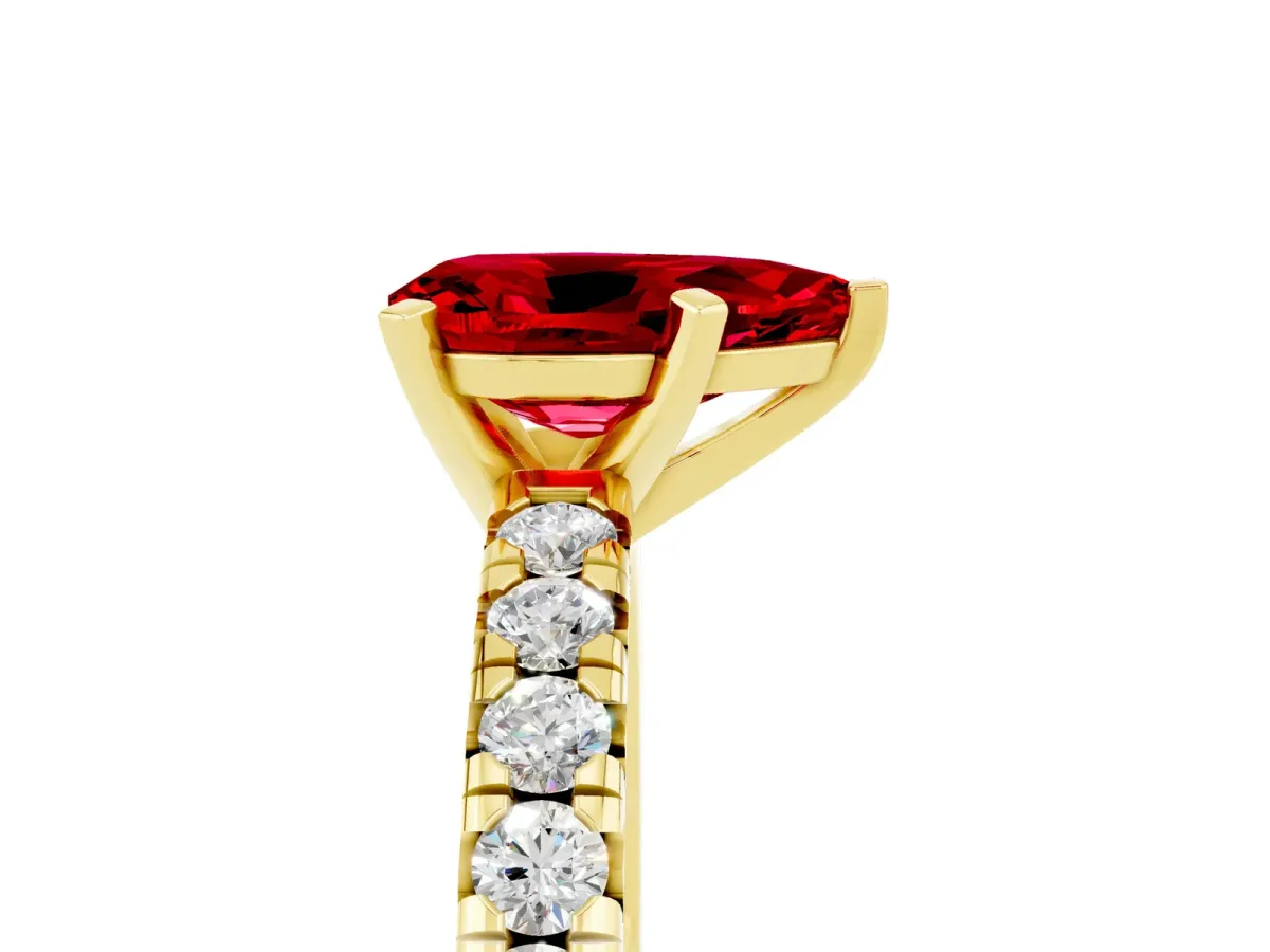 Pear Cut Ruby Solitaire Pavé Engagement Ring with Round Band and Prong Setting Yellow gold