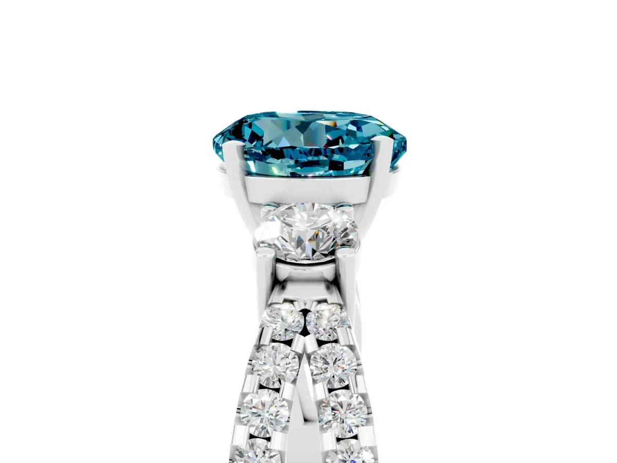 Round Cut Blue Topaz Three-Stone Ring with Pavé Split Shank and Four-Prong Setting Silver