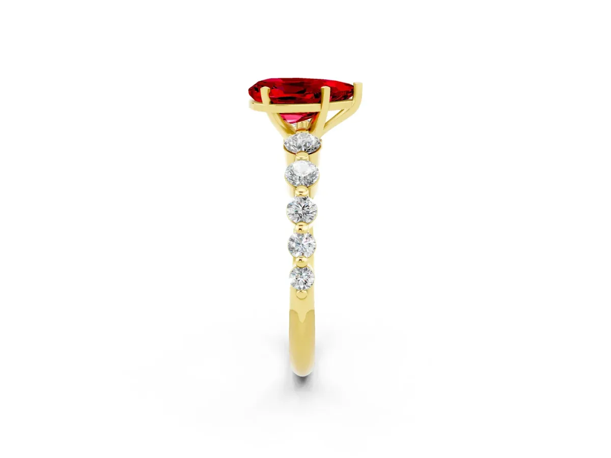 Pear Cut Solitaire Ruby Ring with Pave Band and Four-Prong Setting Yellow gold