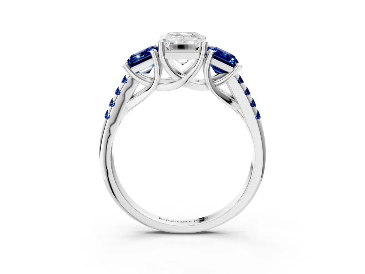Three-Stone Emerald Cut Diamond Ring with Round Blue Sapphire Pavé Band and Prong Setting Silver