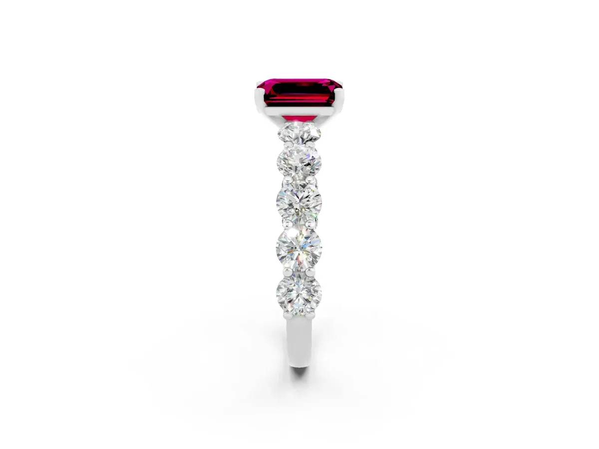 Emerald Cut Garnet Prong Setting with Side Stones on a Pave Band Platinum