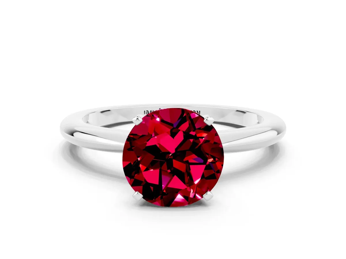 Round Cut Garnet Solitaire Ring with Six-Prong Setting and Classic Band Silver