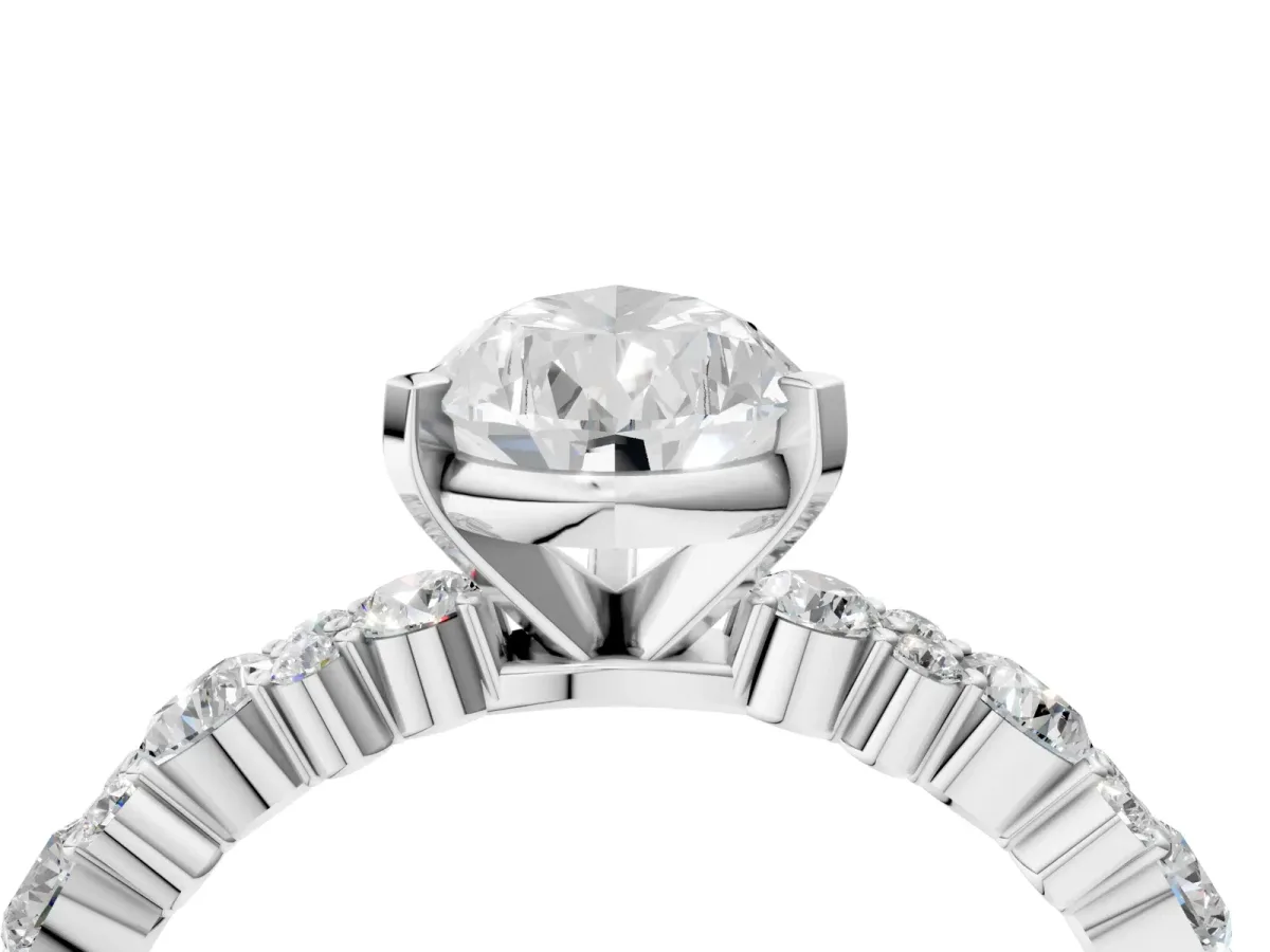 Pear Cut Diamond Side Stone Solitaire Ring with Round and Four-Prong Setting Platinum