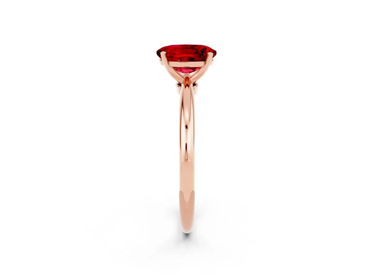 Oval Cut Ruby Solitaire Ring with Six-Prong Setting and Classic Band Rose gold