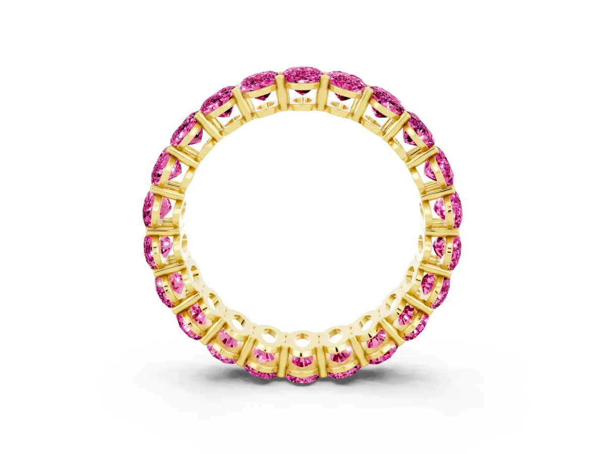 Oval Cut Pink Sapphire Eternity Band with Shared Prong Setting Yellow gold
