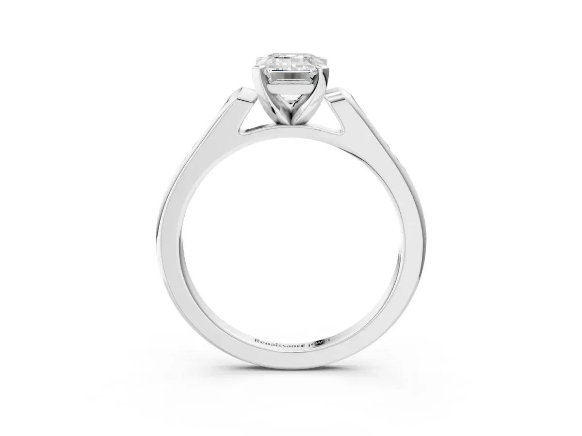 Emerald Cut Diamond Solitaire Ring with Channel Set Round Band and Prong Setting Silver
