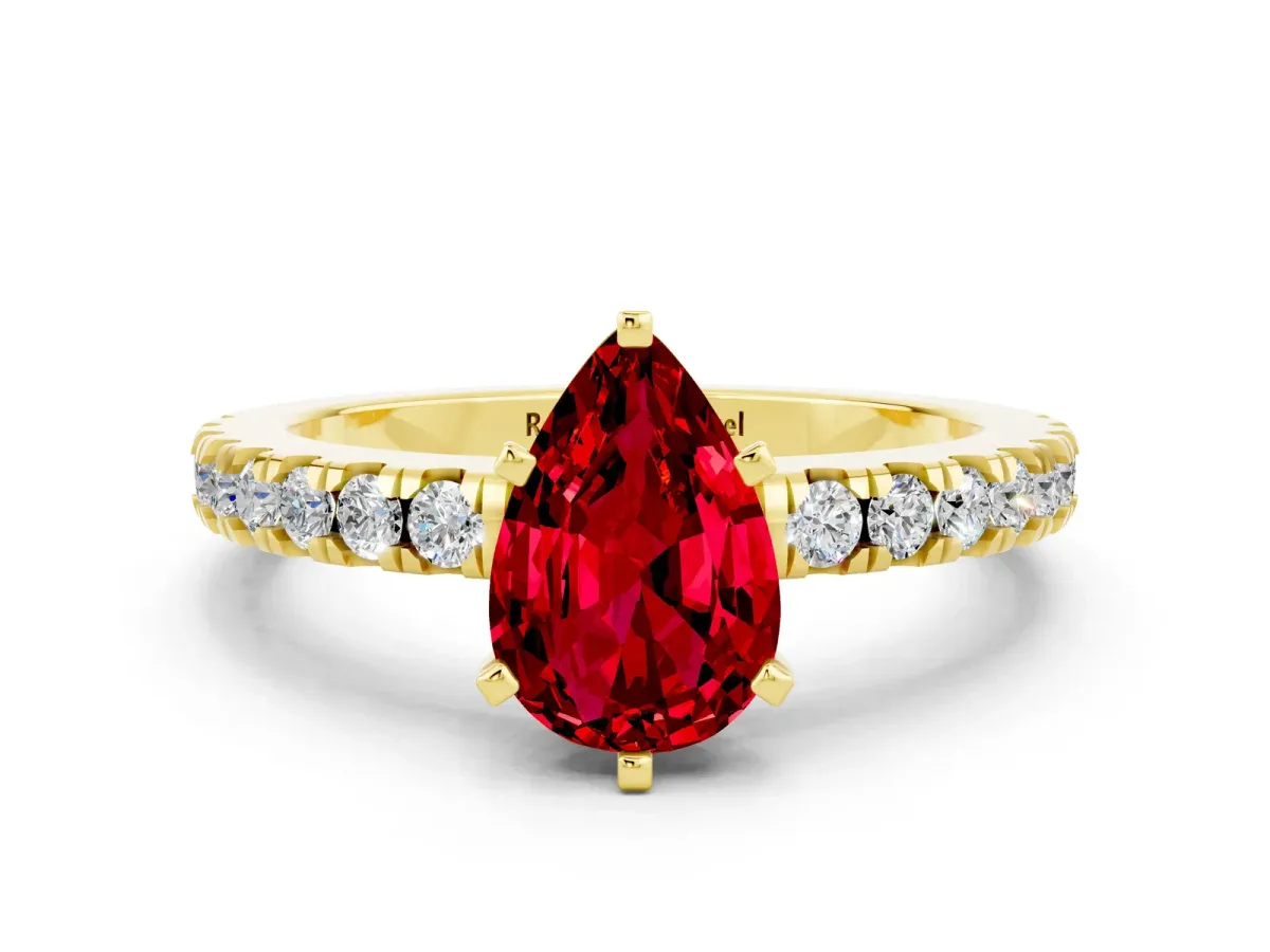 Pear Cut Solitaire Ruby with Pavé Band and Four-Prong Setting Yellow gold