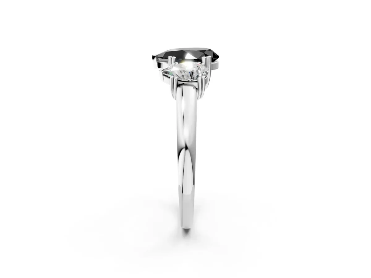 Fancy Black Three-Stone Pear Cut Cut Diamond Ring with Channel Set Band and Four-Prong Setting Silver