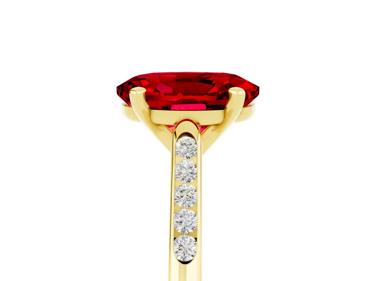 Oval Cut Ruby Solitaire Ring with Channel Set Round Band and Prong Setting Yellow gold