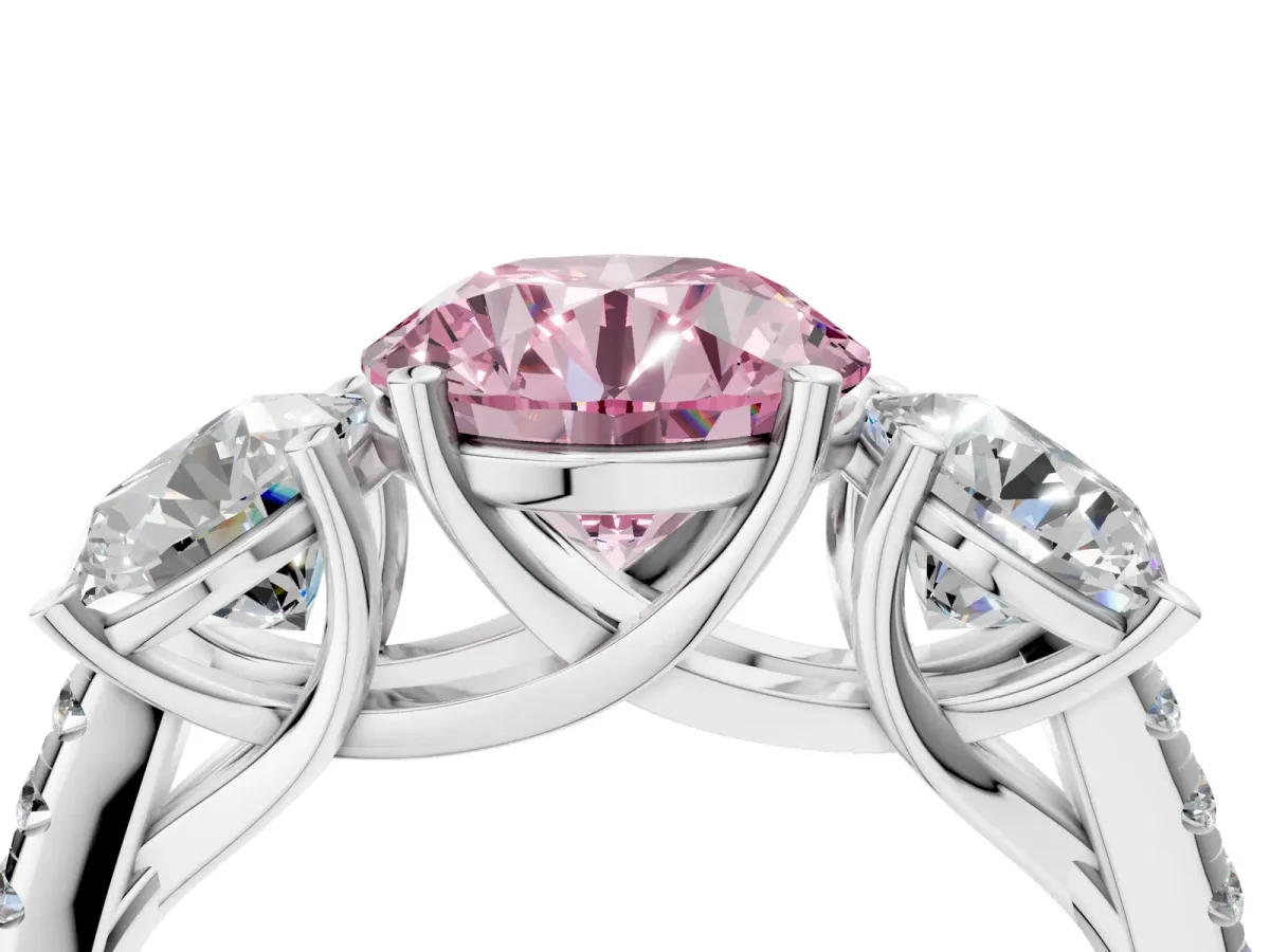 Fancy Pink Three-Stone Round Cut Diamond Ring with Round Pavé Band and Prong Setting Silver