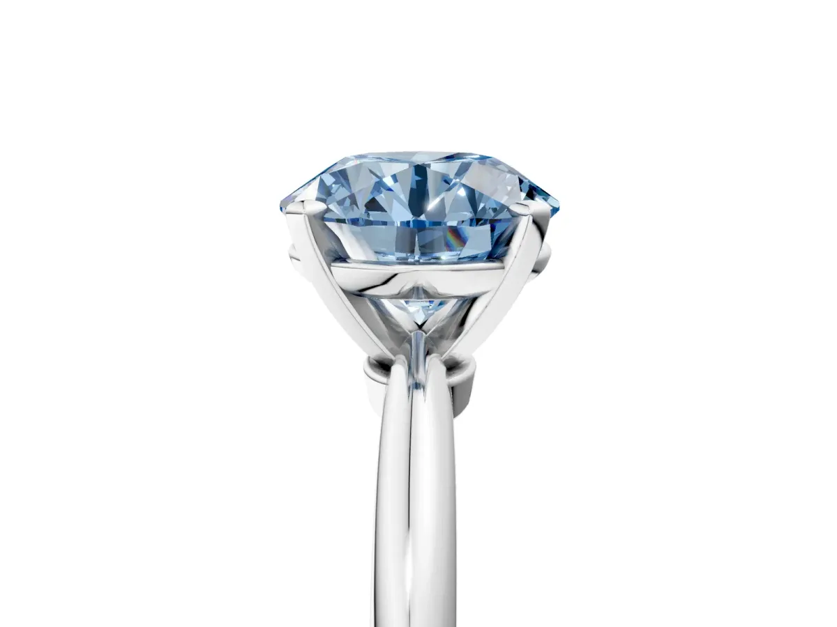 Fancy Blue Round Cut Diamond Solitaire Ring with Six-Prong Setting and Classic Band Silver